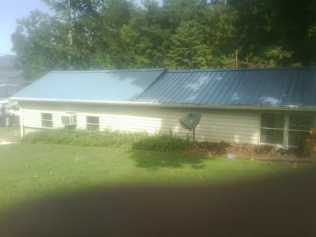 Blue metal roof running the length of a single story home in Clearlake